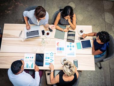 Financial Professionals working at a table